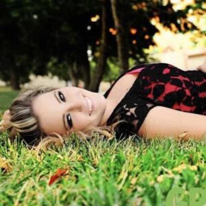 Taylor Doughtery The Hair Standard Las Vegas laying on grass