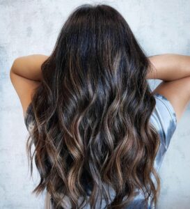 Woman with brunette and a dimensional balayage