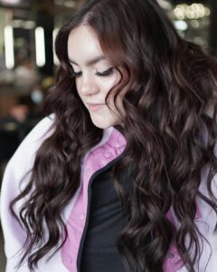 Woman with brunette hair extensions