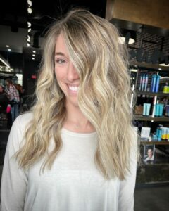Woman with dimensional blonde highlights