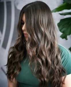 Woman with dimensional brunette hair