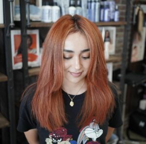 Women with a copper fantasy color blow out