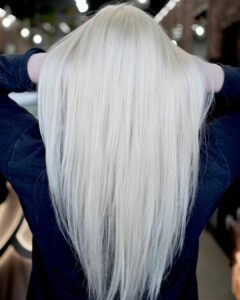 Woman with long platnium blonde hair