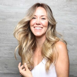 Woman with a stunning lived-in blonde balayage