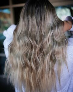 Woman with a dimensional blonde balayage