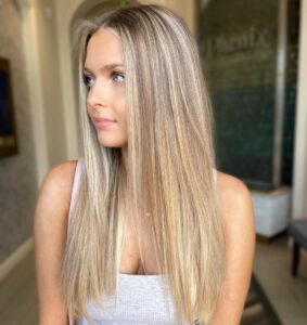 Woman with long stunning babylighted hair
