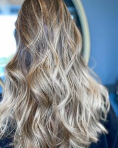 Woman with a lived-in blonde balayage