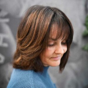 woman with short women's haircut and bangs