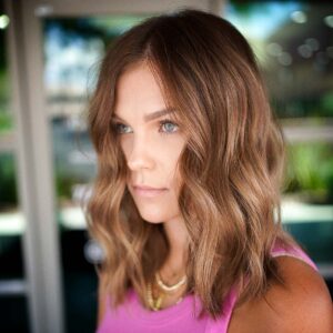 Woman with copper balayage in Las Vegas at The Hair Standard